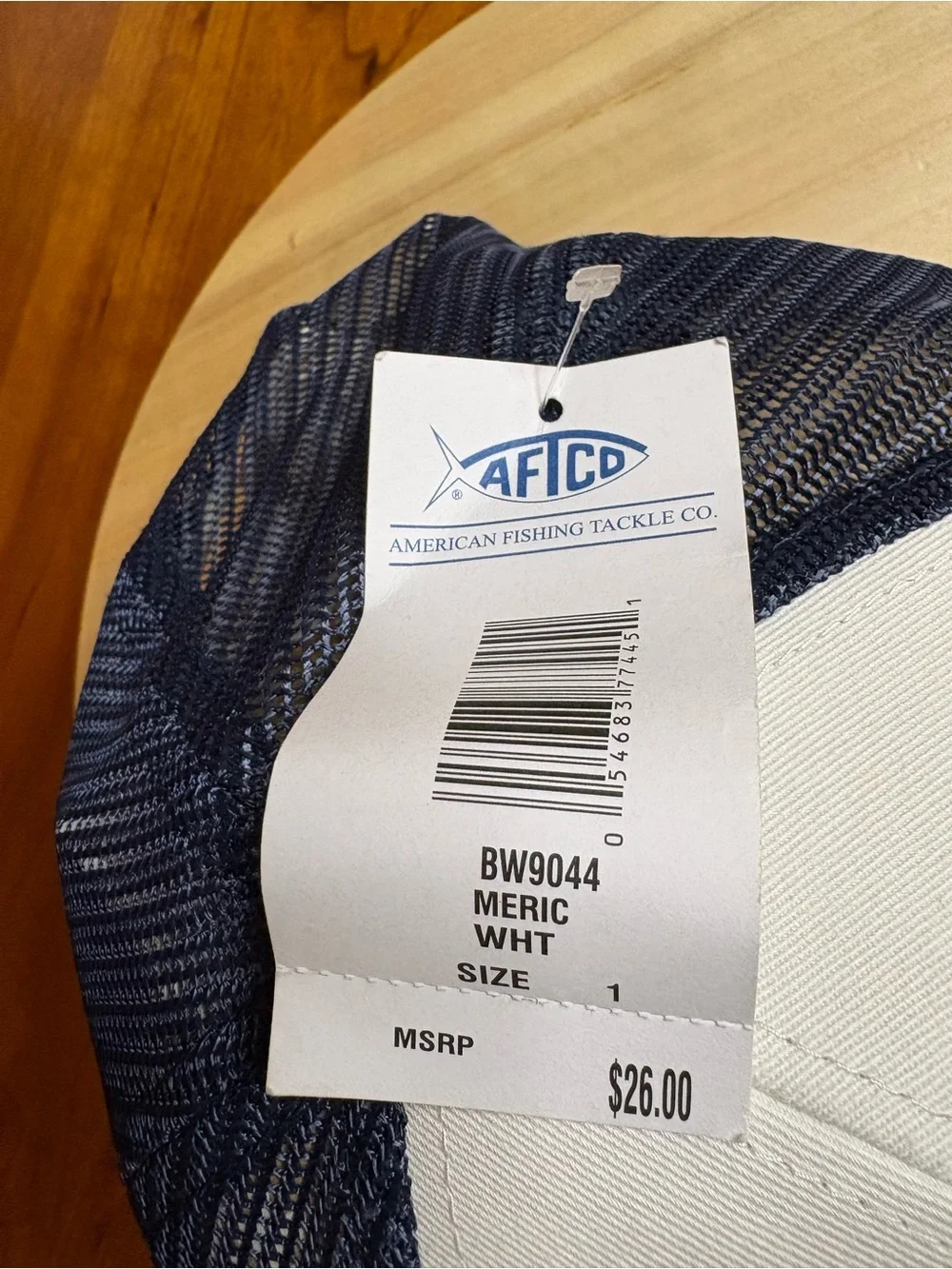 AFTCO Meric trucker hat with an embroidered American flag billfish graphic. NWT